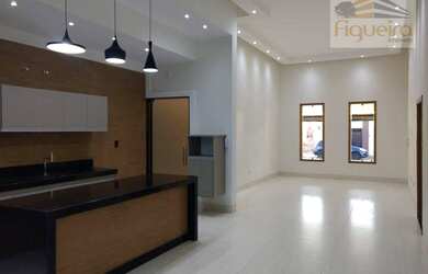 Imagem: A casa possui 3 Dormitórios, 3 Banheiros, 2 Vagas na garagem