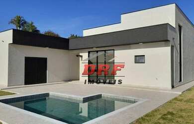 Imagem: A casa em condomínio possui 3 Dormitórios, 2 Banheiros, 4