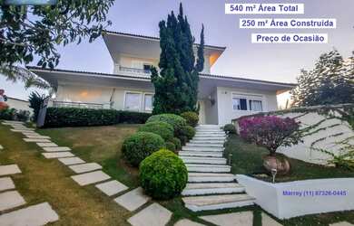 Imagem: A casa possui 3 Dormitórios, 5 Banheiros, 5 Vagas na garagem