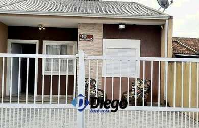 Imagem: A casa possui 2 Dormitórios, 2 Banheiros, 2 Vagas na garagem