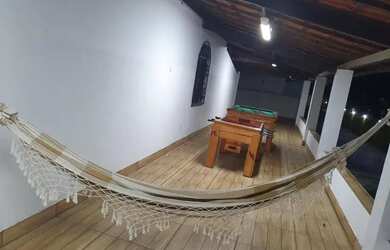 Imagem: A casa possui 5 Dormitórios, 5 Banheiros, 3 Vagas na garagem