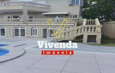 Imagem: A casa em condomínio possui 4 Dormitórios, 5 Banheiros, 4