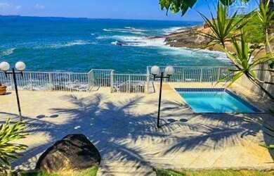 Imagem: A casa possui 4 Dormitórios, 4 Banheiros, 3 Vagas na garagem