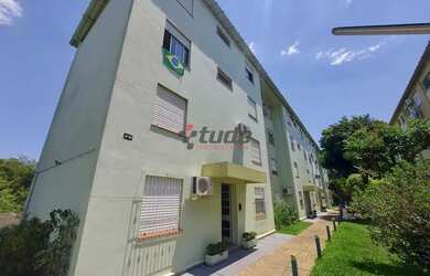 Imagem: O apartamento possui 1 Dormitório, 1 Banheiro, 1 Vaga na garagem