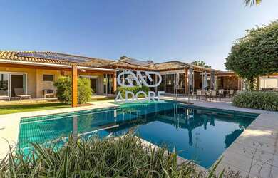 Imagem: A casa em condomínio à venda possui 4 Dormitórios, 5 Banheiros