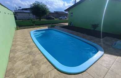 Imagem: A casa possui 2 Dormitórios, 1 Banheiro, 3 Vagas na garagem