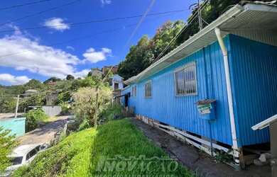 Imagem: A casa possui 3 Dormitórios, 1 Banheiro e 80m² de Área e