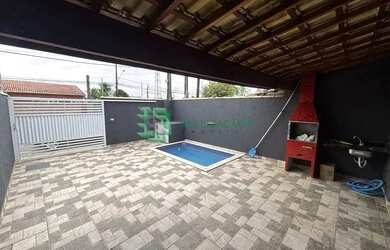 Imagem: A casa possui 2 Dormitórios, 1 Banheiro, 2 Vagas na garagem