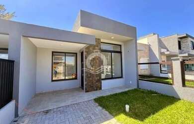 Imagem: A casa possui 3 Dormitórios, 2 Banheiros, 1 Vaga na garagem