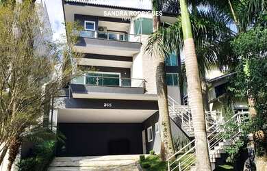 Imagem: A casa em condomínio possui 5 Dormitórios, 5 Banheiros, 2