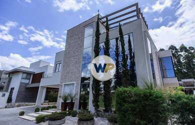 Imagem: A casa em condomínio possui 3 Dormitórios, 5 Banheiros, 4