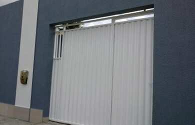 Imagem: A casa possui 2 Dormitórios, 1 Banheiro, 2 Vagas na garagem