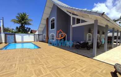 Imagem: A casa possui 5 Dormitórios, 2 Banheiros, 5 Vagas na garagem