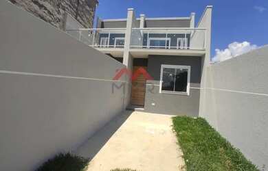 Imagem: A casa possui 3 Dormitórios, 1 Banheiro, 2 Vagas na garagem