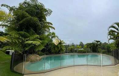 Imagem: A casa em condomínio possui 5 Dormitórios, 5 Banheiros, 3