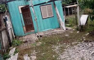 Imagem: A casa possui 1 Dormitório, 1 Banheiro, 5 Vagas na garagem