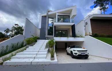 Imagem: A casa em condomínio possui 5 Dormitórios, 5 Banheiros, 4