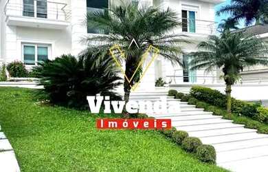 Imagem: A casa em condomínio possui 5 Dormitórios, 5 Banheiros, 5