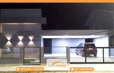 Imagem: A casa possui 4 Dormitórios, 4 Banheiros, 3 Vagas na garagem