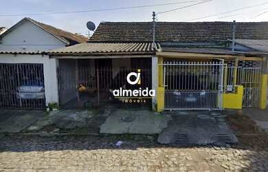 Imagem: A casa possui 2 Dormitórios, 1 Banheiro, 1 Vaga na garagem