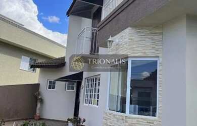 Imagem: A casa possui 3 Dormitórios, 3 Banheiros, 3 Vagas na garagem