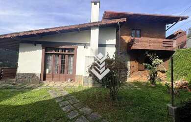 Imagem: A casa à venda possui 4 Dormitórios, 3 Banheiros, 2 Vagas