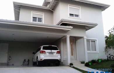 Imagem: A casa em condomínio possui 4 Dormitórios, 4 Banheiros, 2