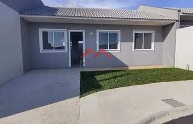 Imagem: A casa possui 3 Dormitórios, 1 Banheiro, 2 Vagas na garagem