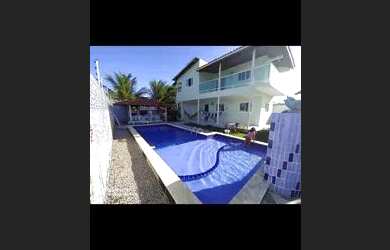 Imagem: A casa possui 5 Dormitórios, 5 Banheiros, 5 Vagas na garagem