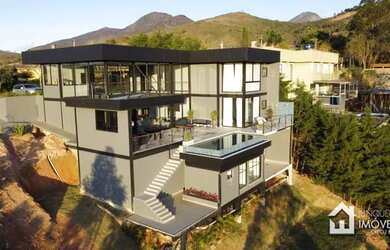 Imagem: A casa em condomínio à venda possui 5 Dormitórios, 5 Banheiros