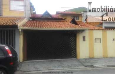 Imagem: A casa possui 4 Dormitórios, 1 Banheiro, 2 Vagas na garagem