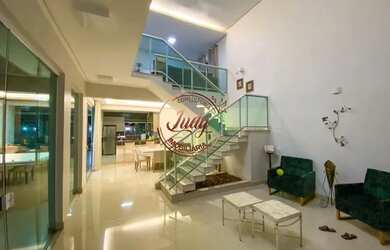 Imagem: A casa possui 4 Dormitórios, 5 Banheiros, 5 Vagas na garagem