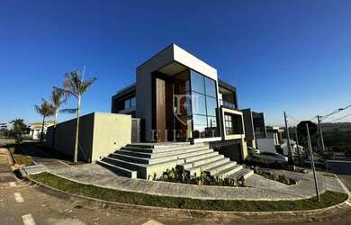 Imagem: A casa em condomínio possui 3 Dormitórios, 3 Banheiros, 4