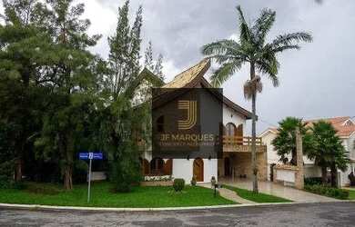 Imagem: A casa em condomínio possui 5 Dormitórios, 5 Banheiros, 4