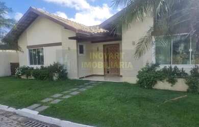 Imagem: A casa possui 3 Dormitórios, 1 Banheiro, 2 Vagas na garagem