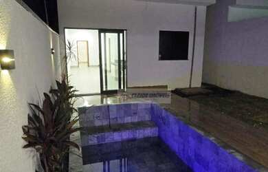 Imagem: A casa possui 3 Dormitórios, 2 Banheiros, 3 Vagas na garagem