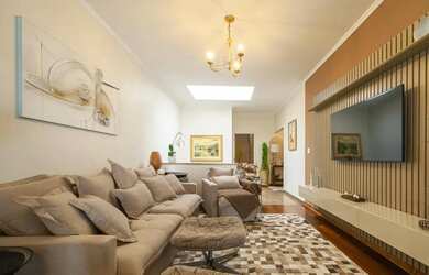 Imagem: A casa possui 3 Dormitórios, 5 Banheiros, 5 Vagas na garagem