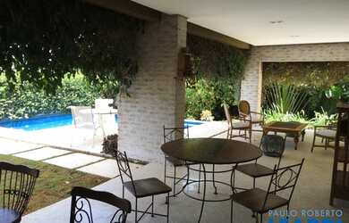 Imagem: A casa em condomínio possui 4 Dormitórios, 5 Banheiros, 4