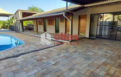 Imagem: A casa possui 2 Dormitórios, 4 Banheiros, 4 Vagas na garagem