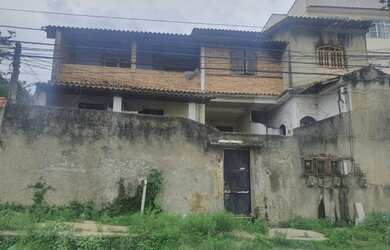 Imagem: A casa possui 3 Dormitórios, 1 Banheiro, 70m² de Área e