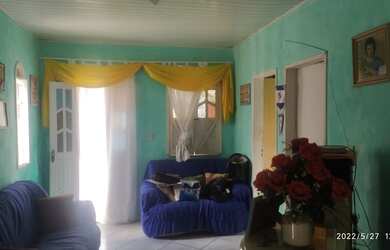 Imagem: A casa possui 2 Dormitórios, 1 Banheiro, 2 Vagas na garagem