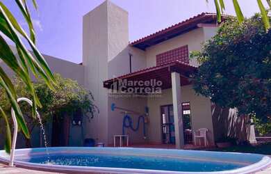 Imagem: A casa possui 4 Dormitórios, 4 Banheiros, 2 Vagas na garagem