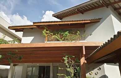 Imagem: A casa em condomínio possui 4 Dormitórios, 2 Banheiros, 3