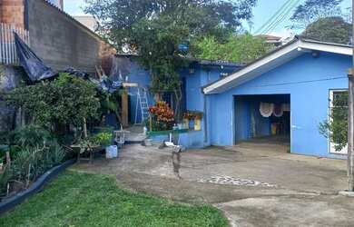 Imagem: A casa possui 2 Dormitórios, 1 Banheiro, 1 Vaga na garagem