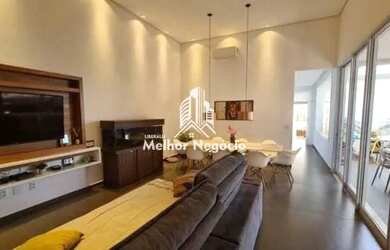 Imagem: A casa possui 3 Dormitórios, 3 Banheiros, 4 Vagas na garagem