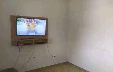 Imagem: A casa possui 3 Dormitórios, 2 Banheiros, 3 Vagas na garagem