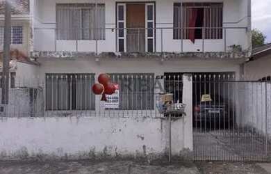 Imagem: A casa possui 4 Dormitórios, 2 Banheiros, 2 Vagas na garagem