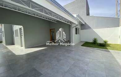 Imagem: A casa possui 3 Dormitórios, 2 Banheiros, 4 Vagas na garagem