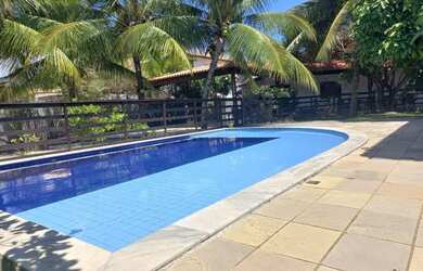 Imagem: A casa possui 2 Dormitórios, 3 Banheiros, 5 Vagas na garagem