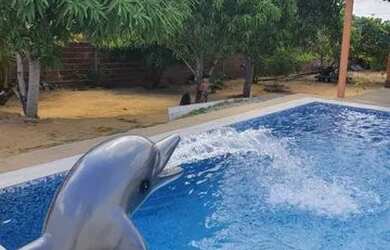 Imagem: A casa possui 3 Dormitórios, 2 Vagas na garagem e está localizado